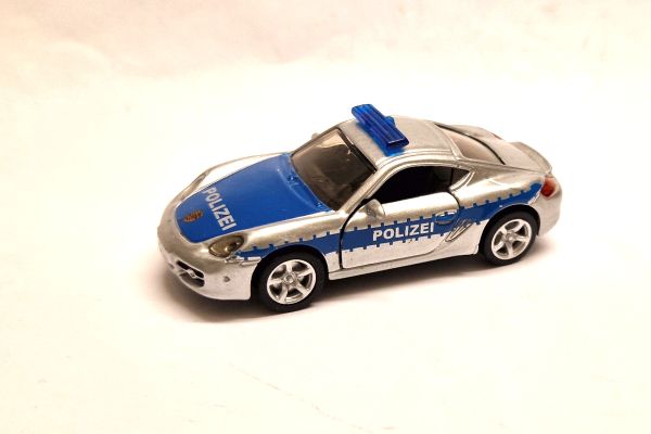 gebraucht! Siku 1416 Porsche Cayman S "Polizei" silber/blau - fast wie neu