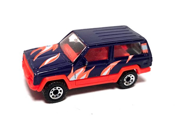 gebraucht! Matchbox Jeep Cherokee 1986 lila/orange 1:58 - leicht bespielt