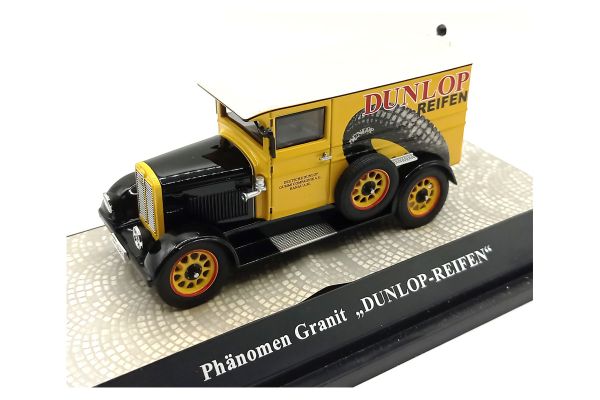 NOS! Premium ClassiXXs 010640 Phänomen Granit "Dunlop Reifen" gelb/schwarz Maßstab 1:43 Modellauto