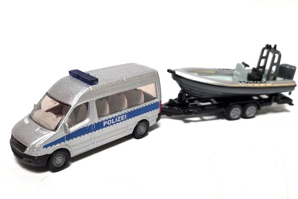 gebraucht! Siku 1638 Mercedes-Benz Sprinter mit Boot Polizei silber/blau - fast wie neu