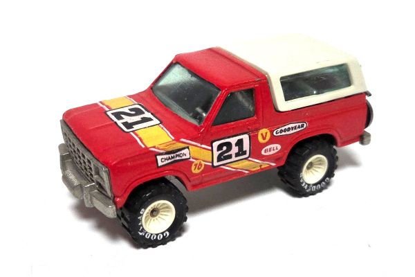 gebraucht! Hot Wheels Ford Bronco #21 rot 1980 Good Year Gummireifen mit Motorrad - ganz leicht besp